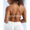 imageAJISAI Womens Halter Neck Padded Strappy Bra Seamless Sports Bras Backless Wireless with Removable Pads for Workout Gym YogaWhite